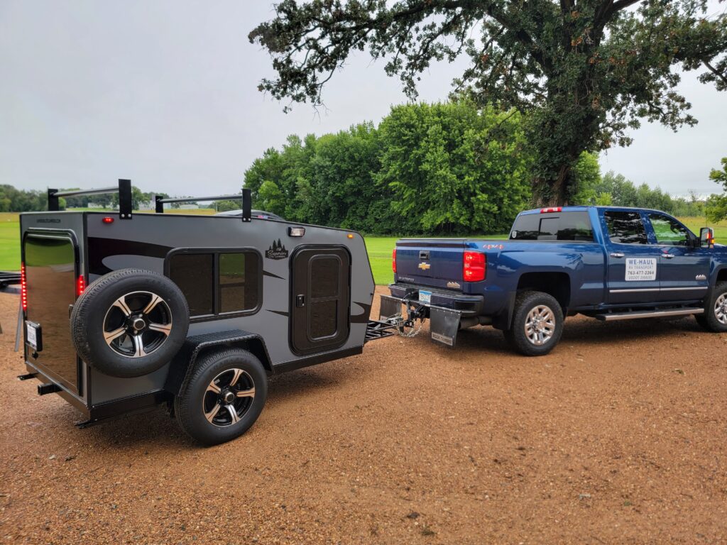 pick-up truck pulling a superior lite trailer