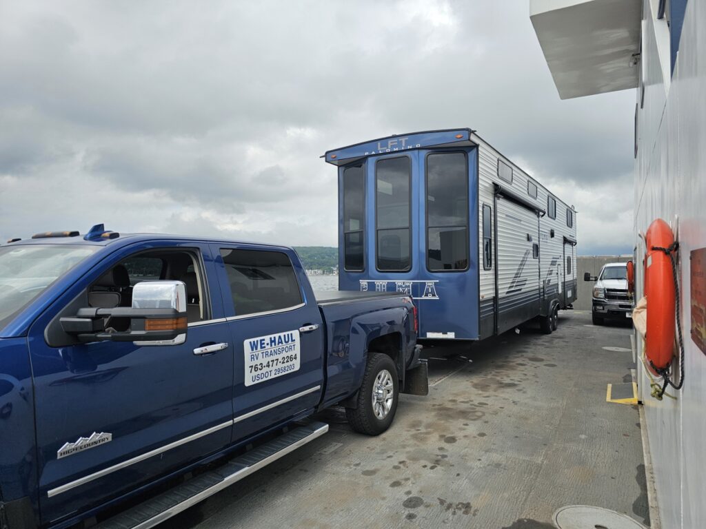 camper trailer and truck on a ferry boat